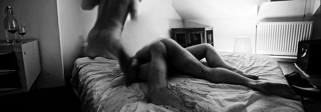 couple in the bedroom. Black and white photo of man and woman