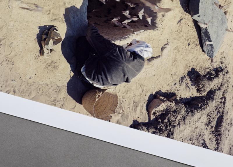 Bats flying out of a grave in Sudan — Sudan series, photograph by Mathieu Drouet