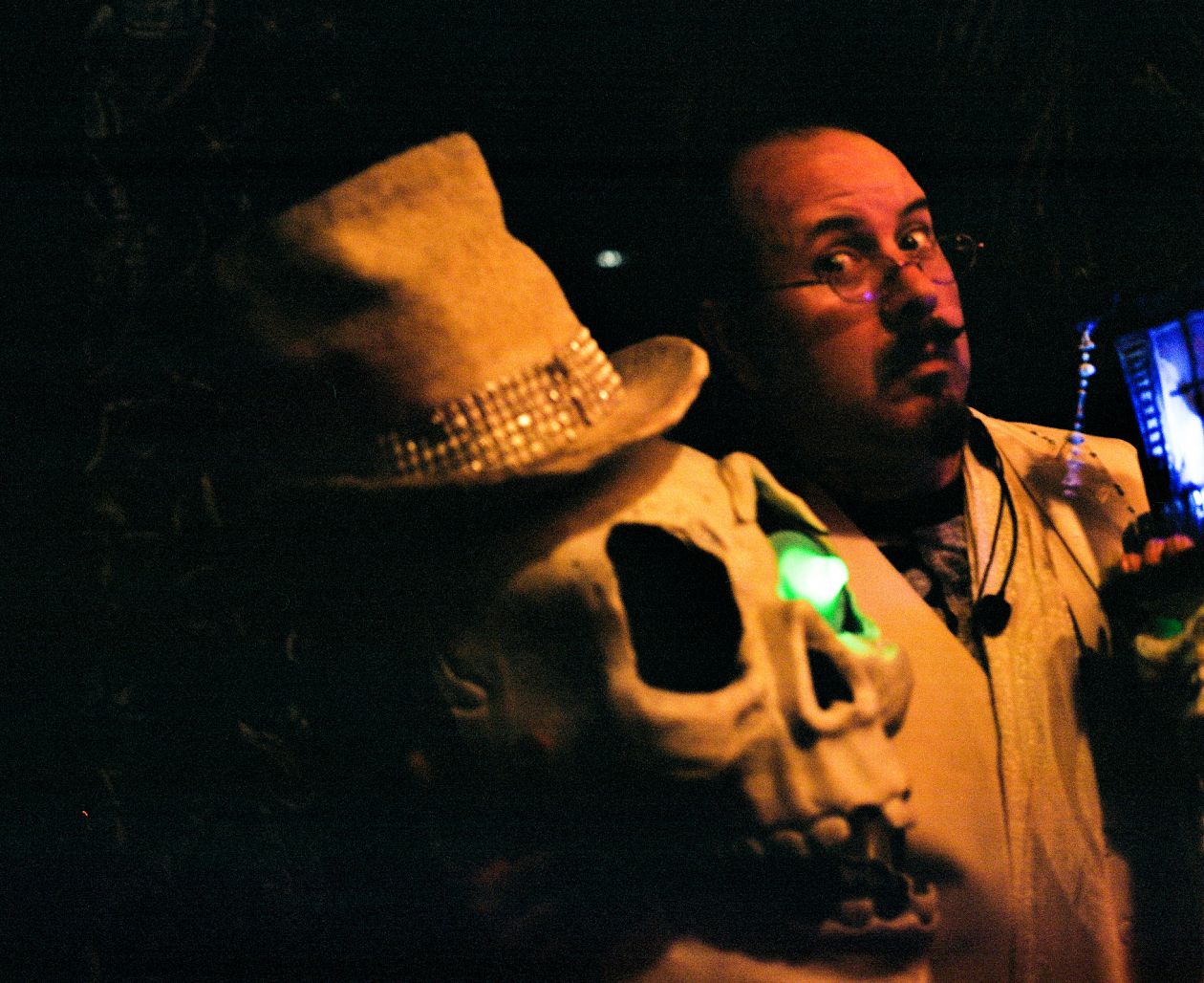 Unknown man in a hat with a skull at night in News Orleans, USA.